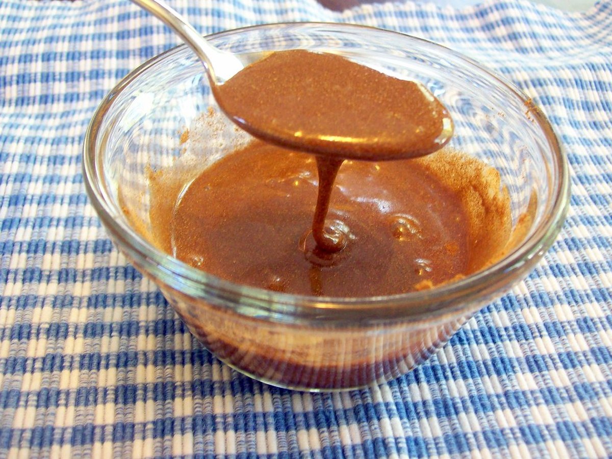 Zimt und Zucker vermischt auf einem Löffel
